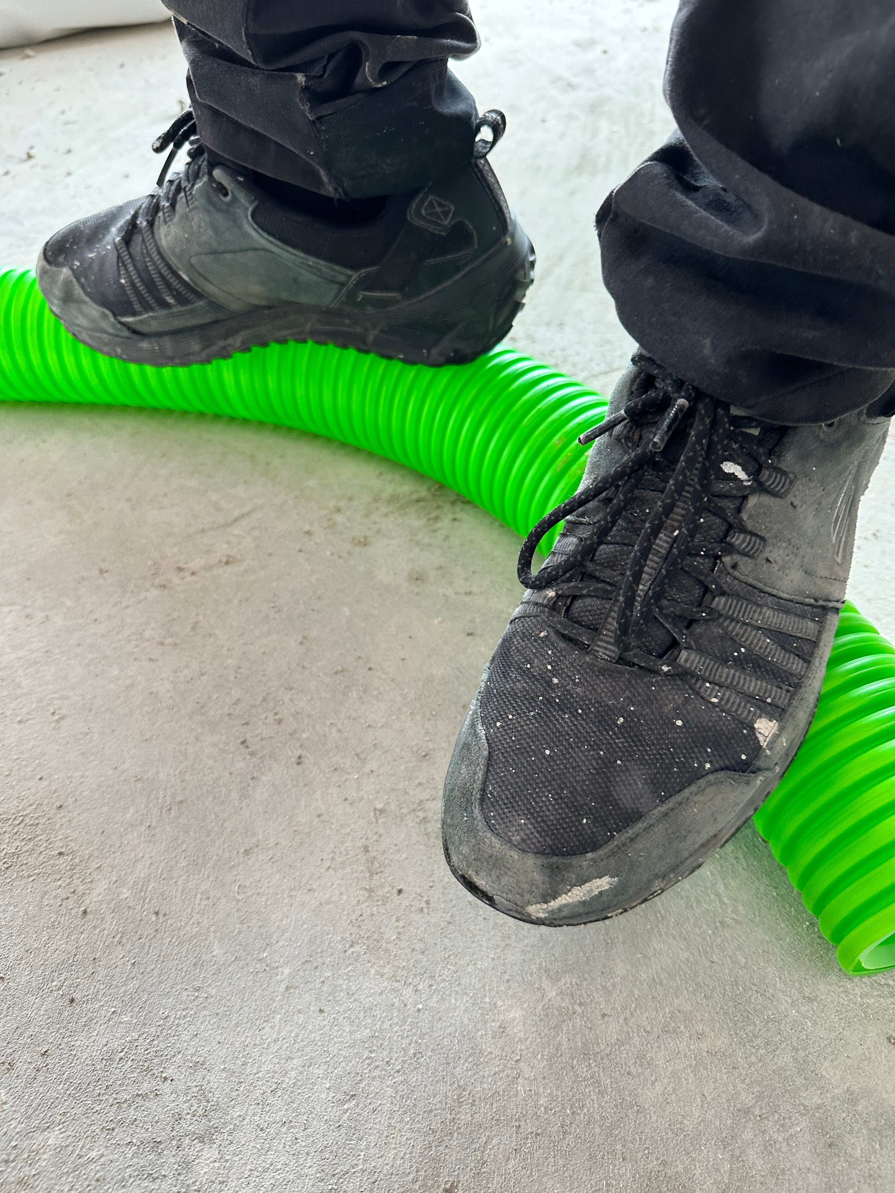 Plumbavent S90 ducting showing strength with someone standing on it